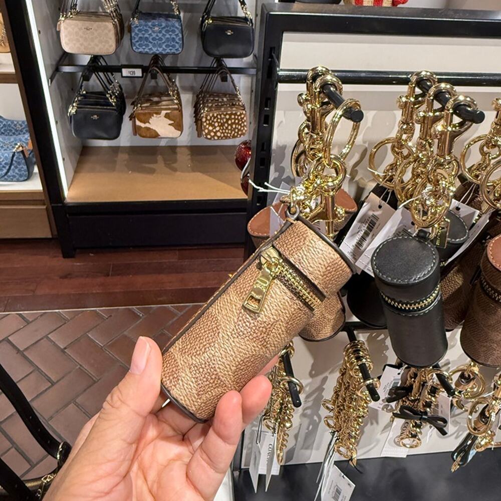Coach Lipstick Case Bag Charm In Signature Canvas  CEM84 Gold/Tan/Brown